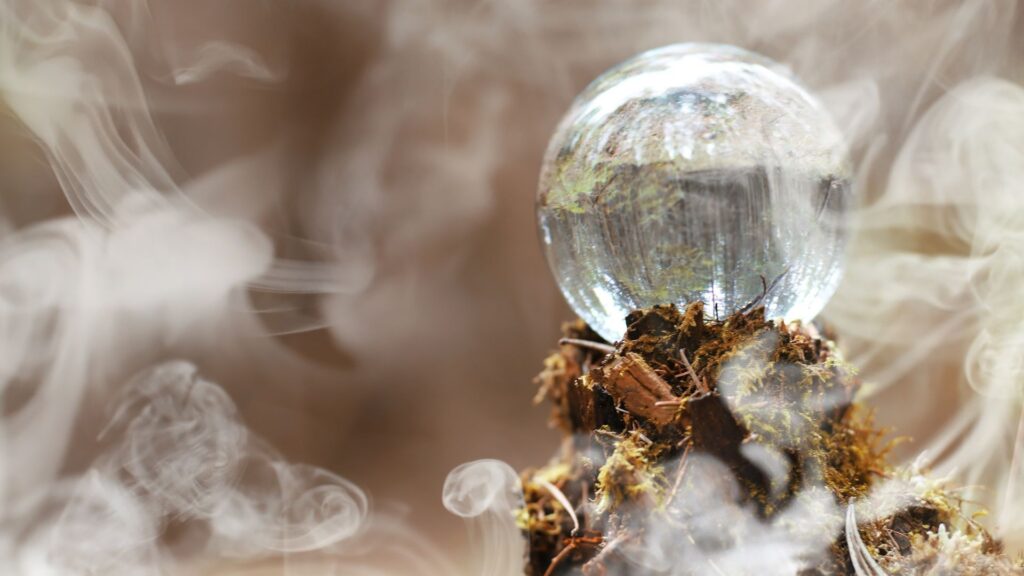 A close up of a light bulb with smoke coming out