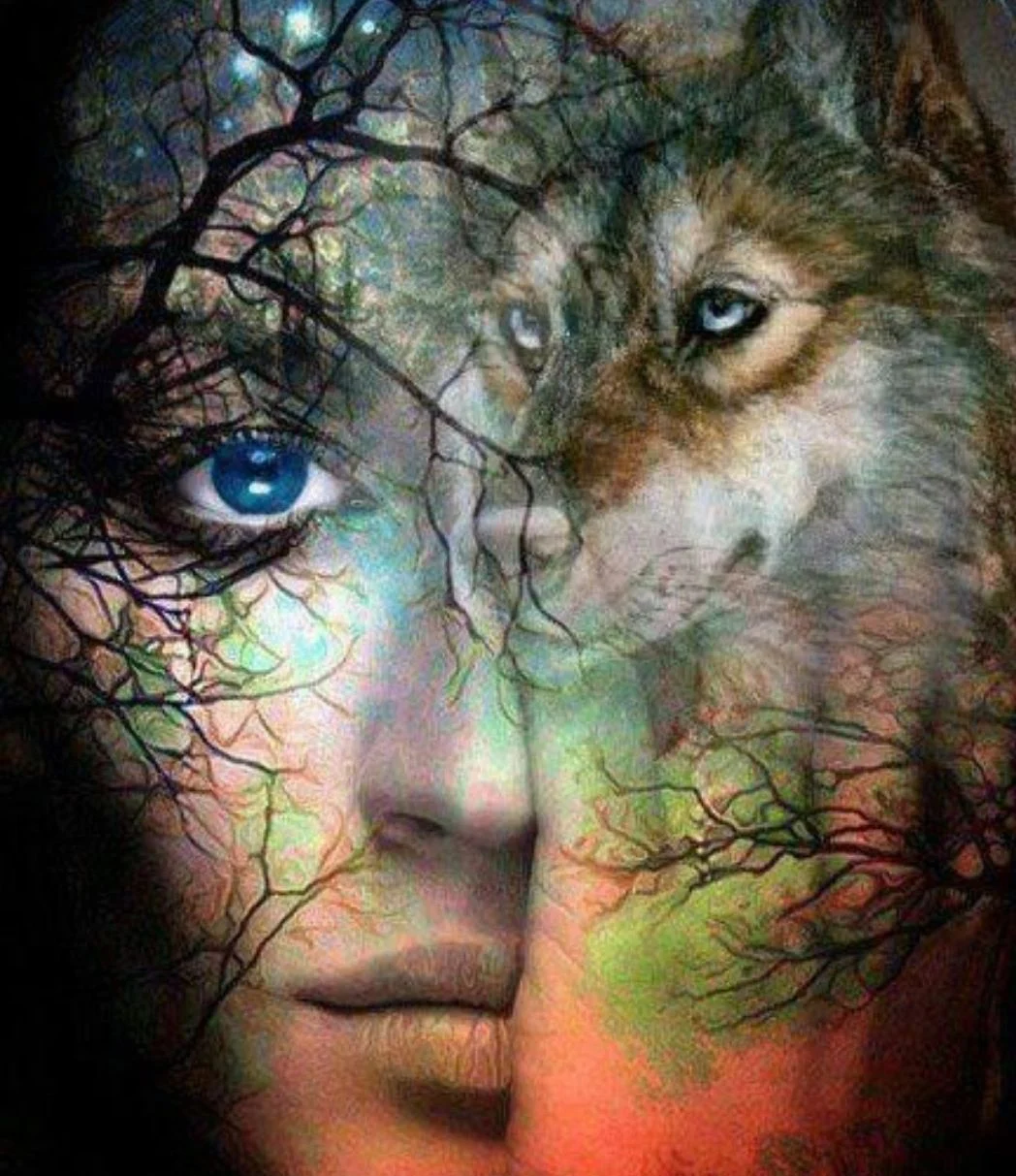 A woman with blue eyes and a wolf behind her.